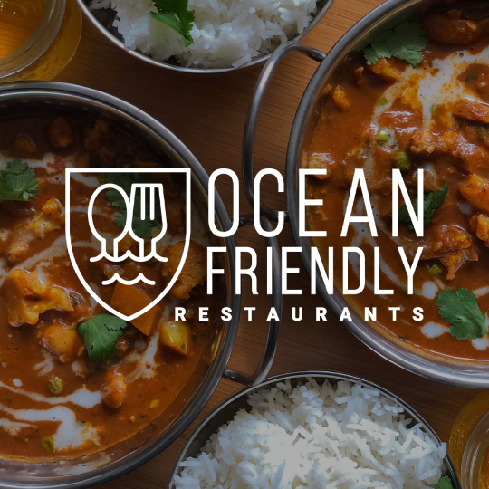 Ocean Friendly Restaurants logo over top bowls of warm food